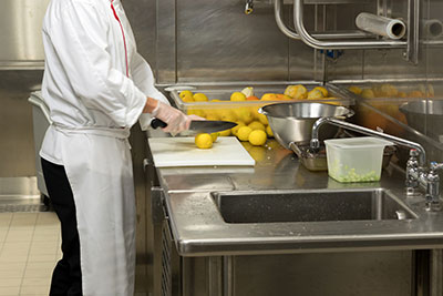 Stainless Steel Fabrication for the food service industry - Bench tops in a commercial kitchen