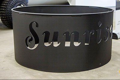 Custom Firepit with personalized cut out made using plasma cutting technology